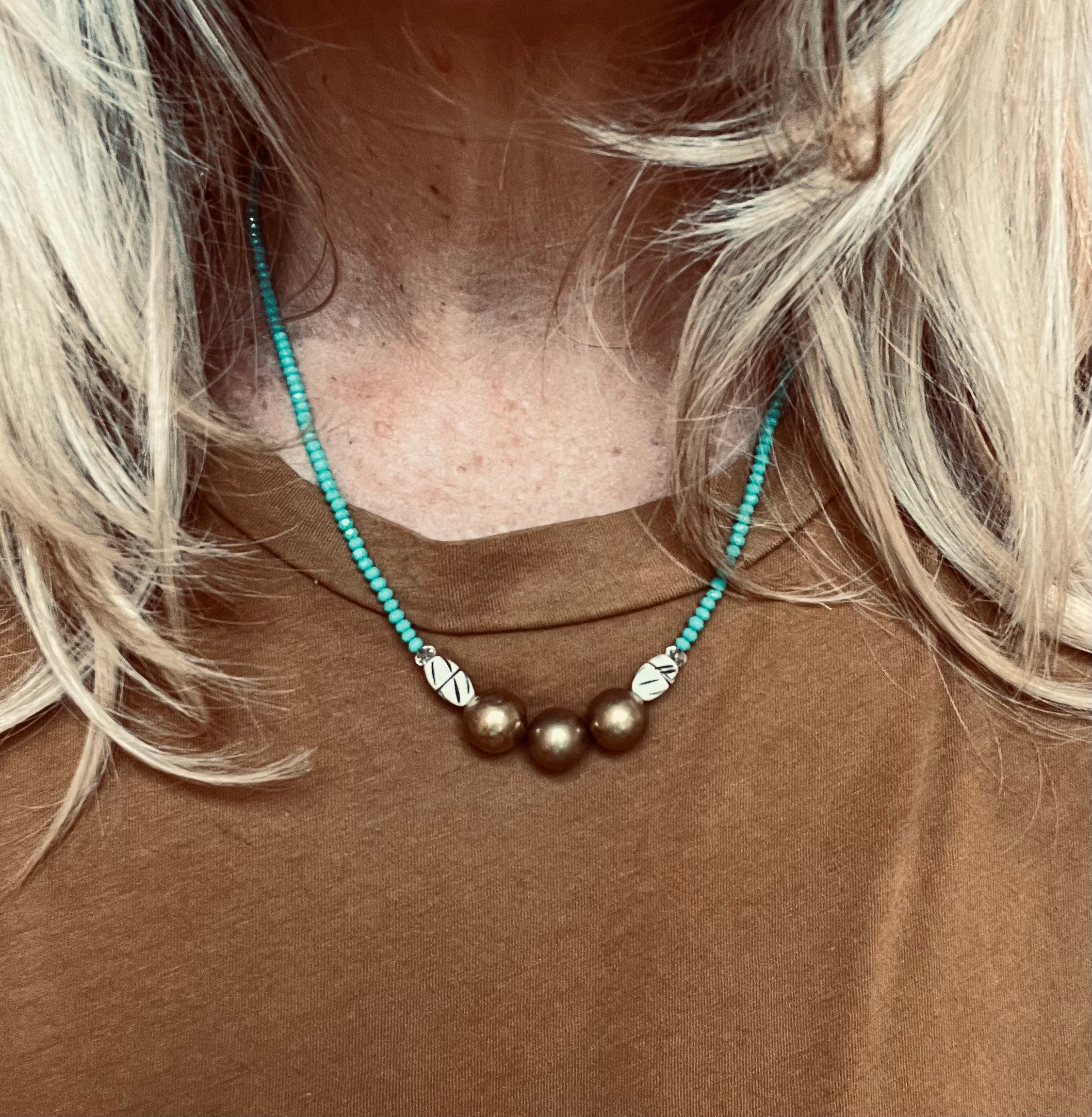 Brass on Turquoise