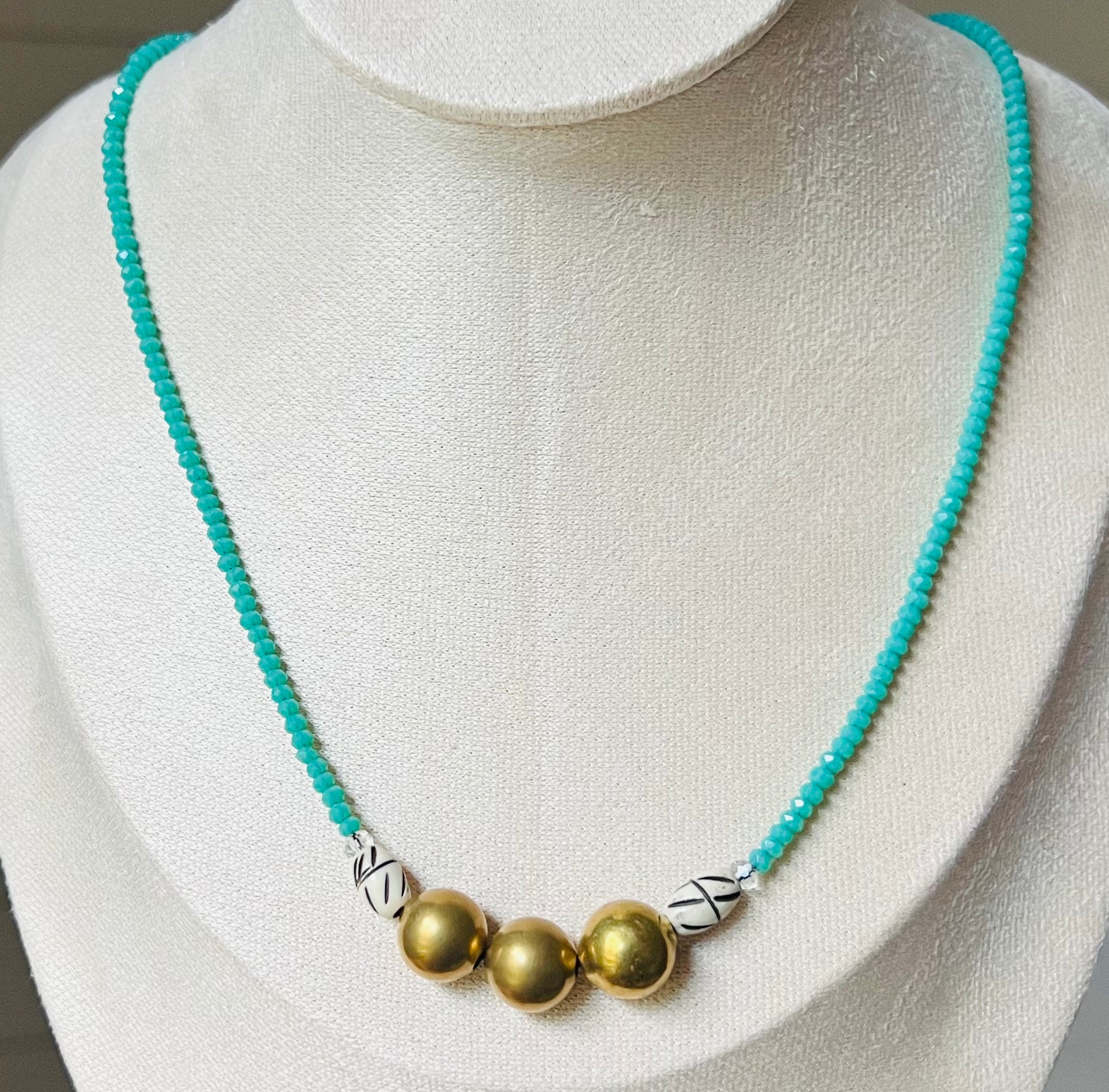 Brass on Turquoise