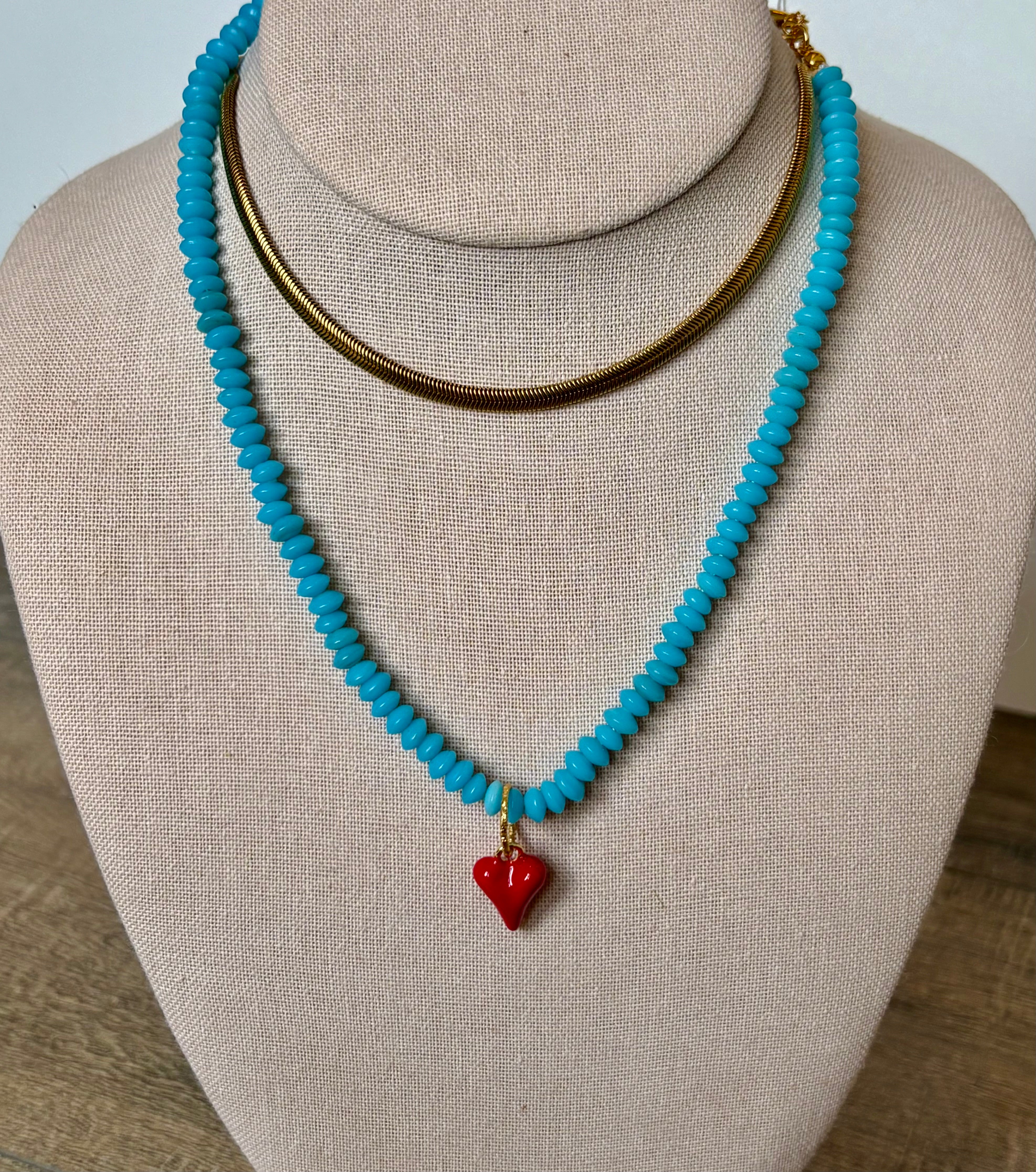 Bright blue with red enamel heart
